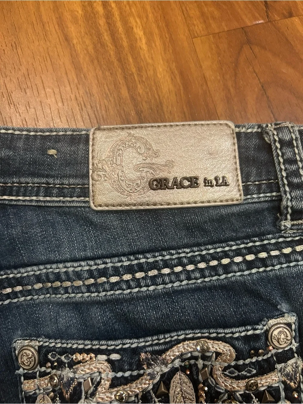 Grace in La Bootcut Women’s Cowgirl Rodeo Feathered Jeans 28 Wash Fade